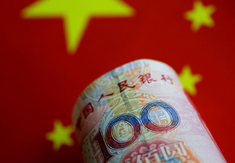 China Warns: Defending Yuan at 7 per Dollar Won’t Come Cheap