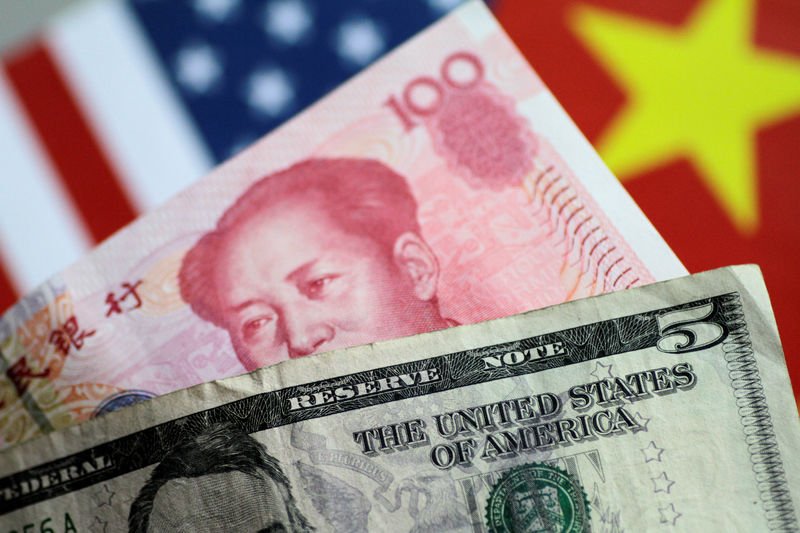Dollar edges lower as U.S.-China trade optimism lifts Aussie